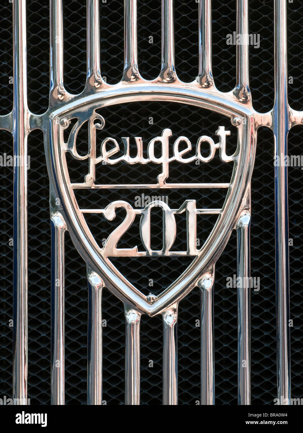 Radiator grille and badge of 1929-1937 French Peugeot 201 saloon car. Stock Photo
