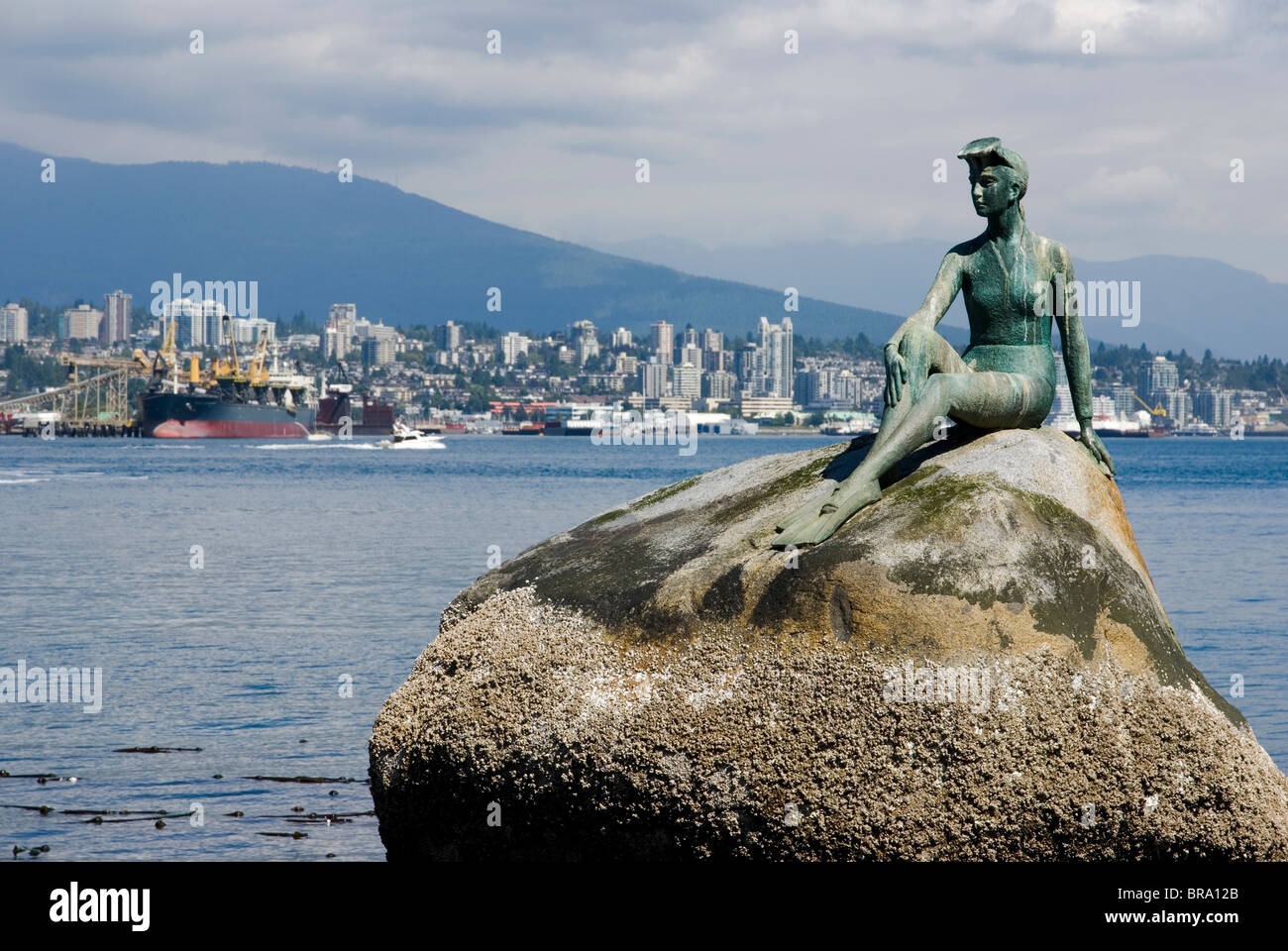 'Girl in a wetsuit', sculpture by Elek Imredy. Stanley Park, Vancouver Stock Photo