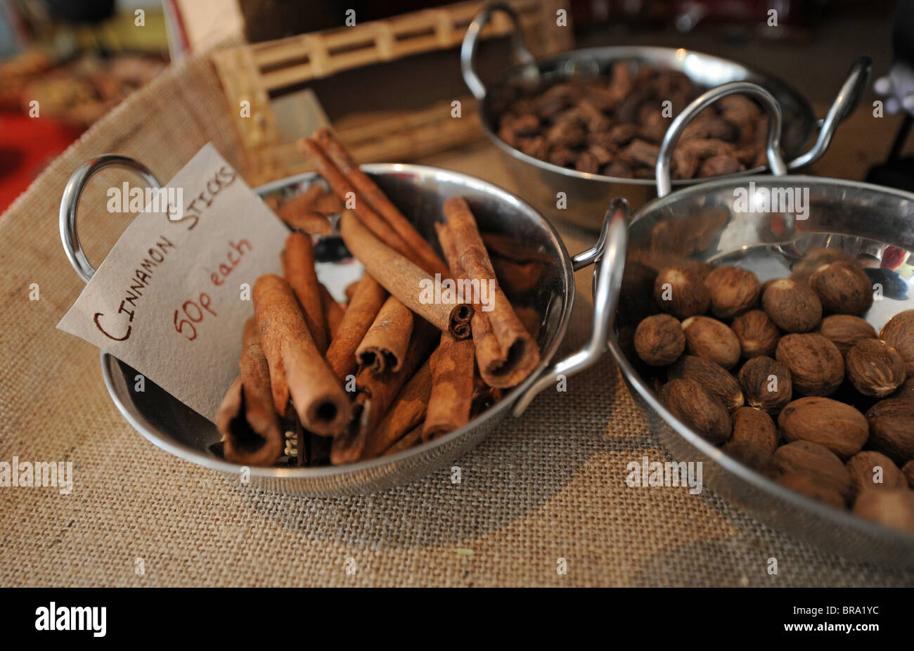 Cinnamon sticks and nutmeg on display in a shop Brighton UK Stock Photo