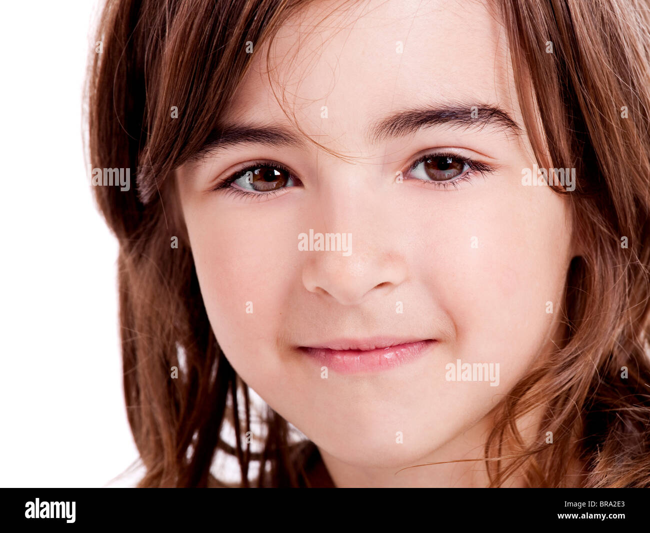 Portrait of a cute little girl isolated over white background Stock ...