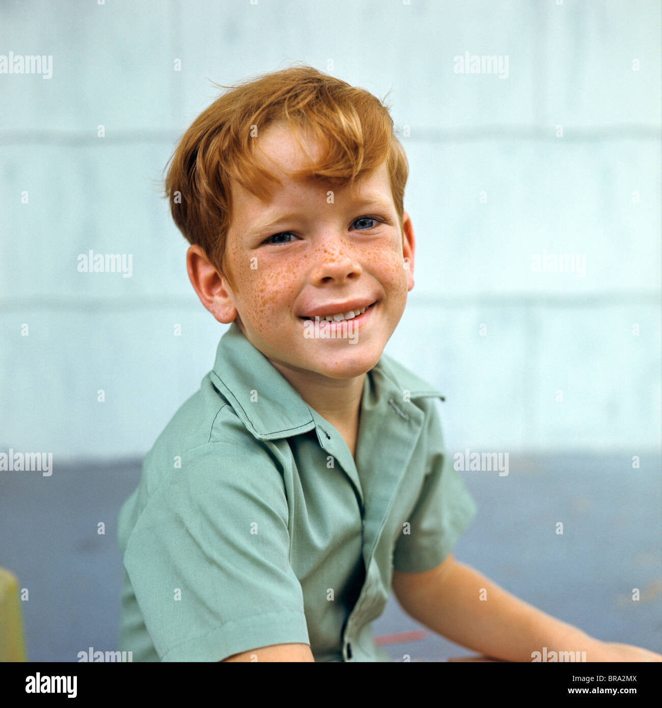 1970 1970s RETRO PORTRAIT OF SMILING BOY RED HAIR FRECKLES Stock Photo