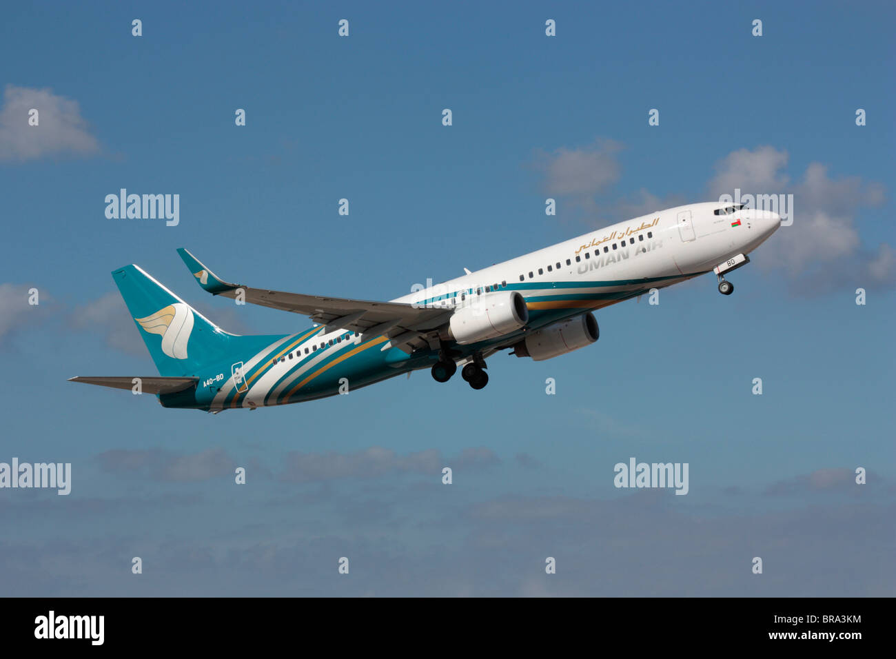 Oman Air Boeing 737-800 commercial jet airplane on takeoff Stock Photo