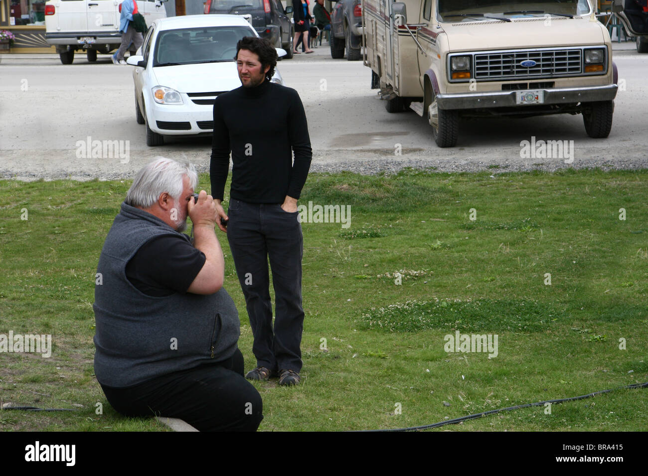 Fat man taking a picture Stock Photo
