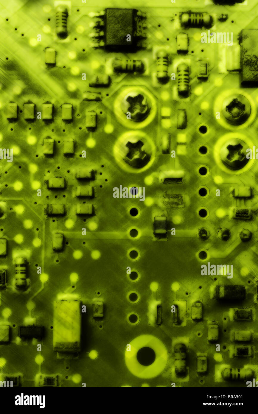 Abstract background of blurred old circuit board in green shade Stock Photo
