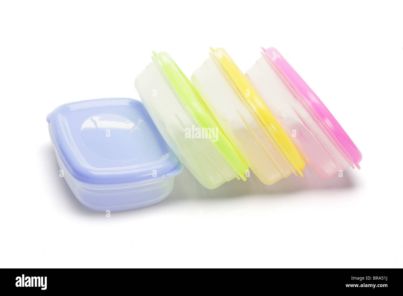 Four plastic storage containers on white background Stock Photo