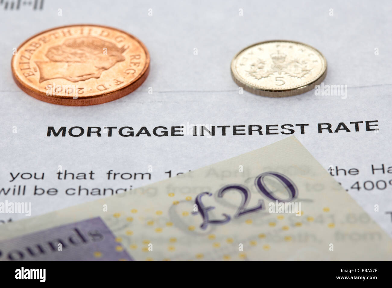 letter from a bank regarding mortgage interest rate with cash and sterling notes Stock Photo