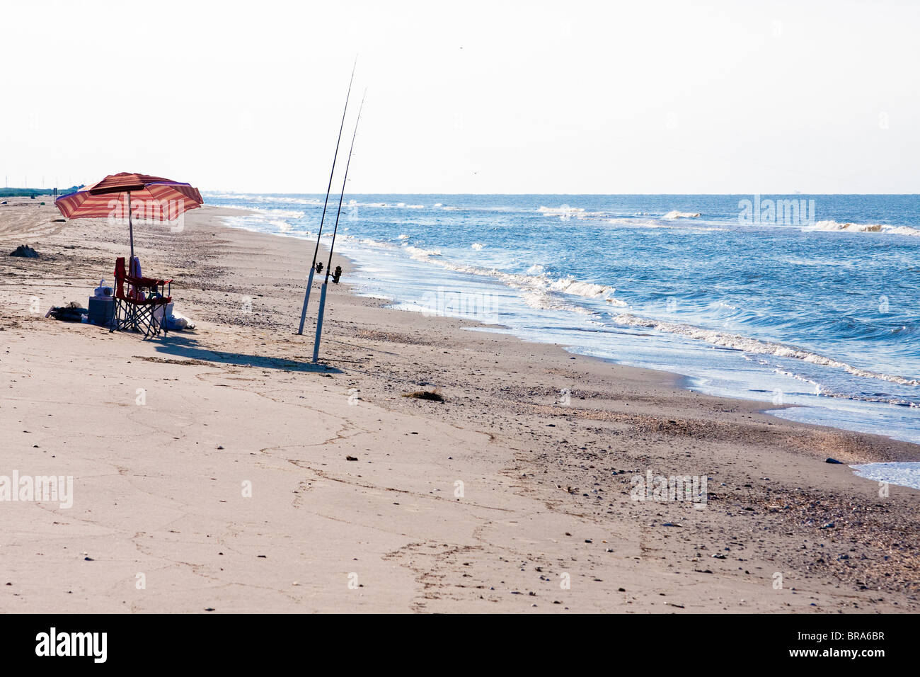 Fishing poles at the ready on Holly Beach near Cameron, Louisiana on
