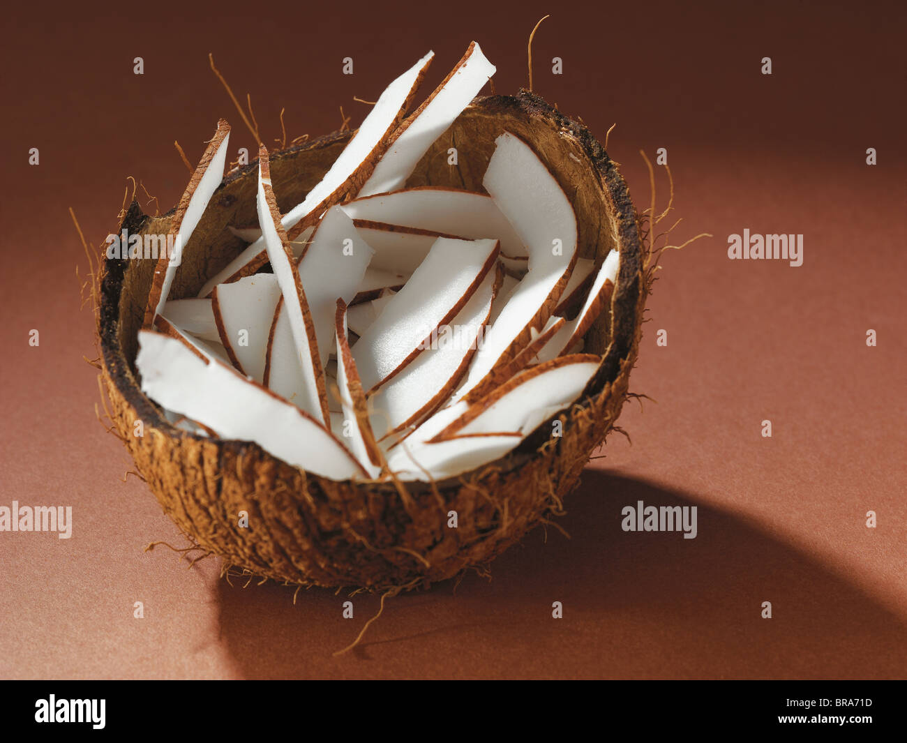 Coconut pieces in its cover Stock Photo