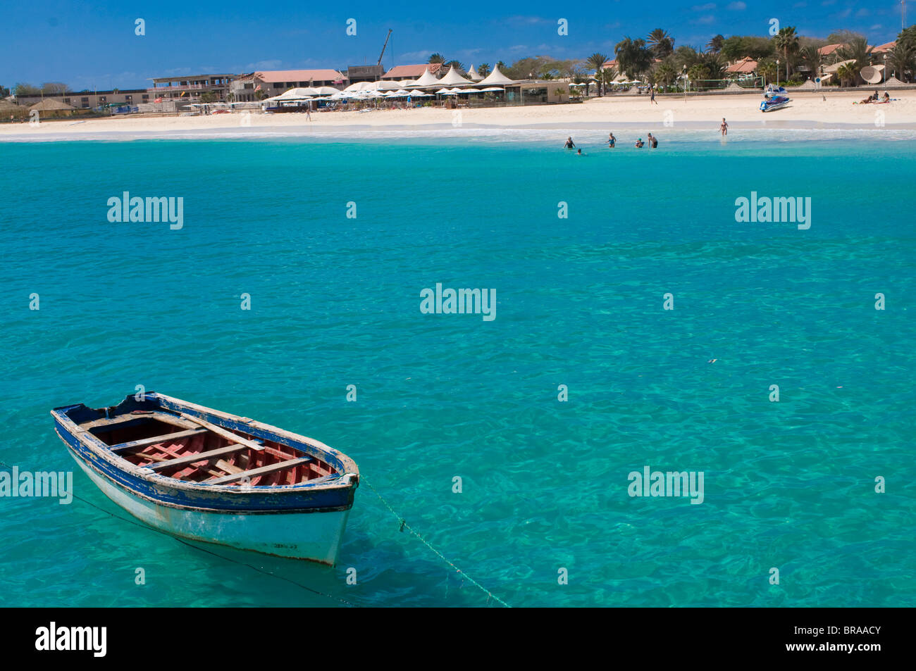 Rowboat in blue sea off coast, Santa Maria, Sal, Cape Verde Islands, Atlantic, Africa Stock Photo