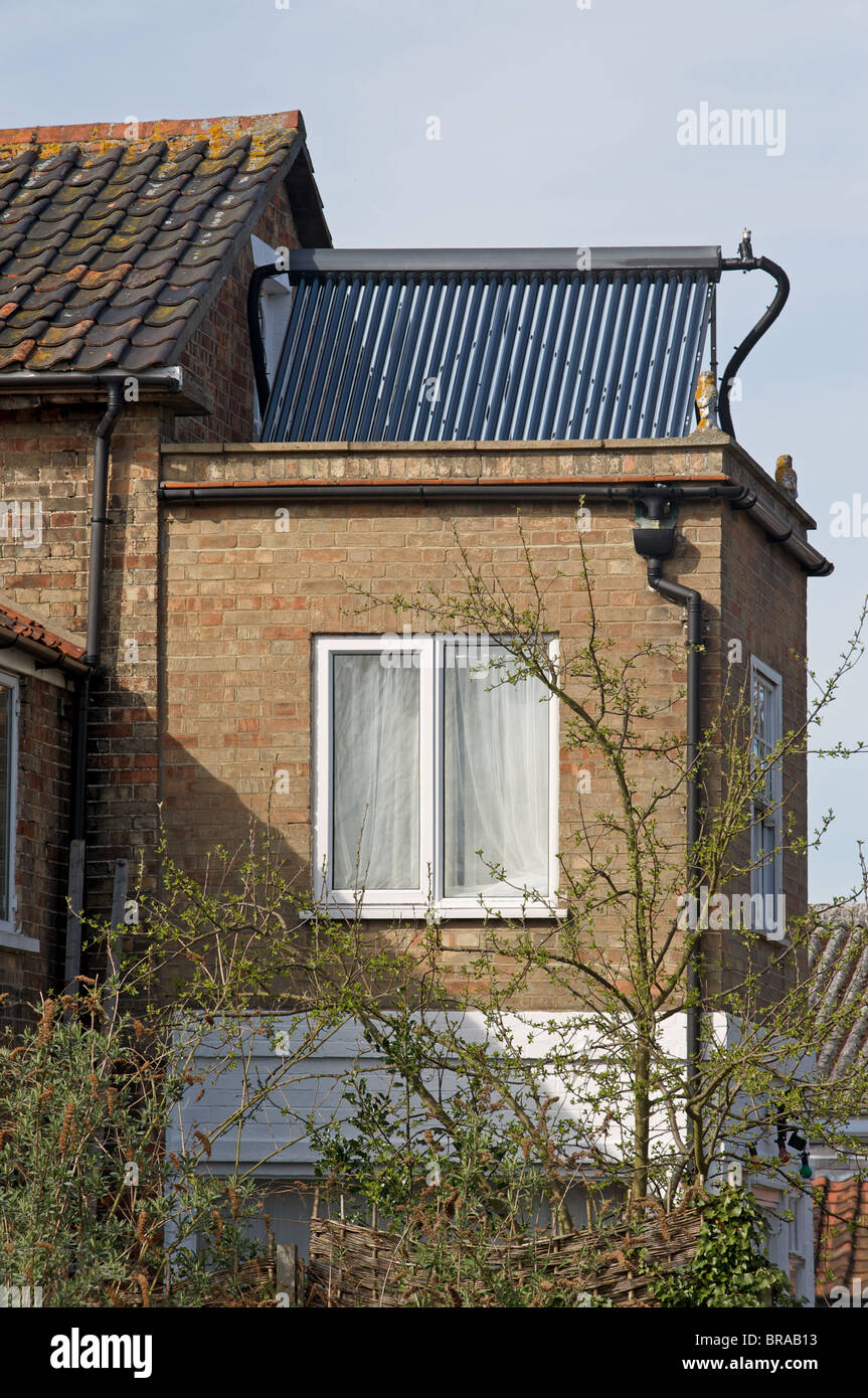 Evacuated or solar tubes positioned on a south facing flat roof Stock ...