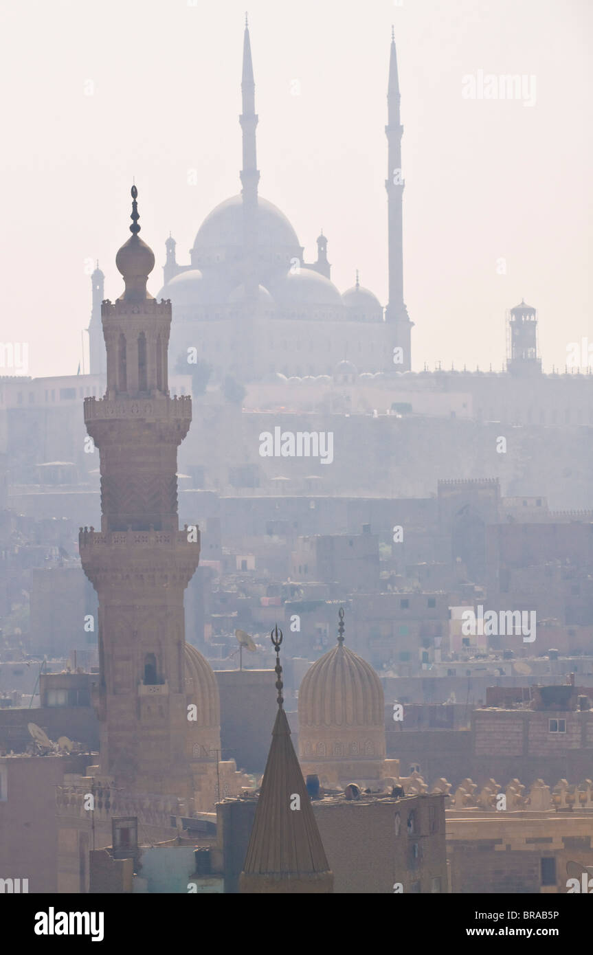 The minarets of the mosques of the old city in the smog, Cairo, Egypt, North Africa, Africa Stock Photo