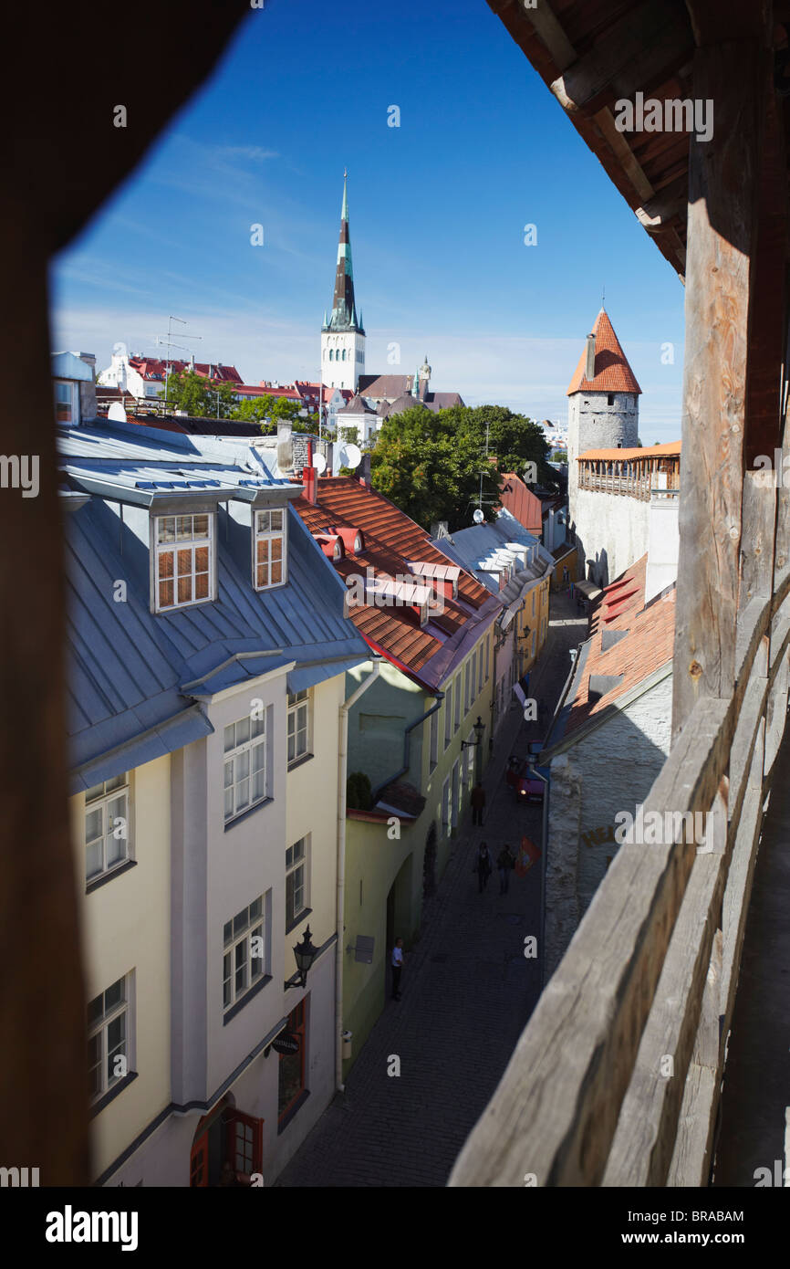 View of Lower Town from Town Wall with Oleviste Church in background, Tallin, Estonia, Baltic States, Europe Stock Photo