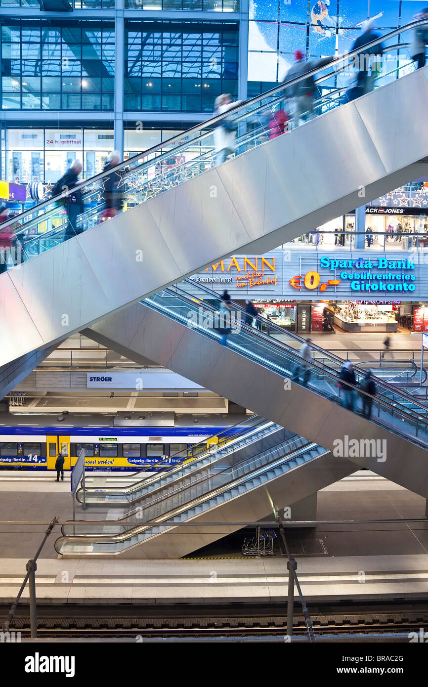 People moving up escalator at new modern main railway station, Berlin, Germany, Europe Stock Photo