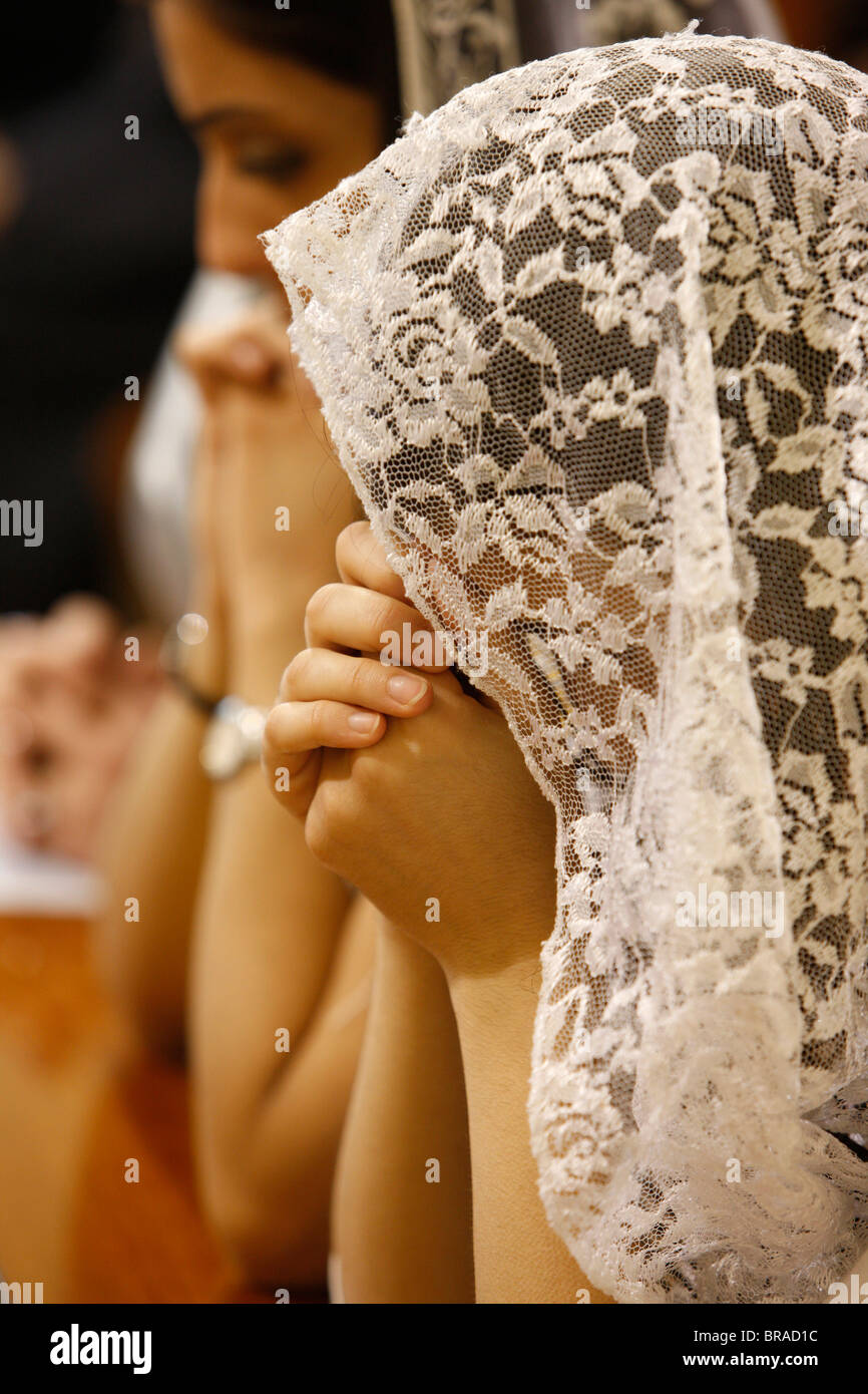 Women wearing embroidered veils, Holy Mass, Beit Jala, West Bank ...
