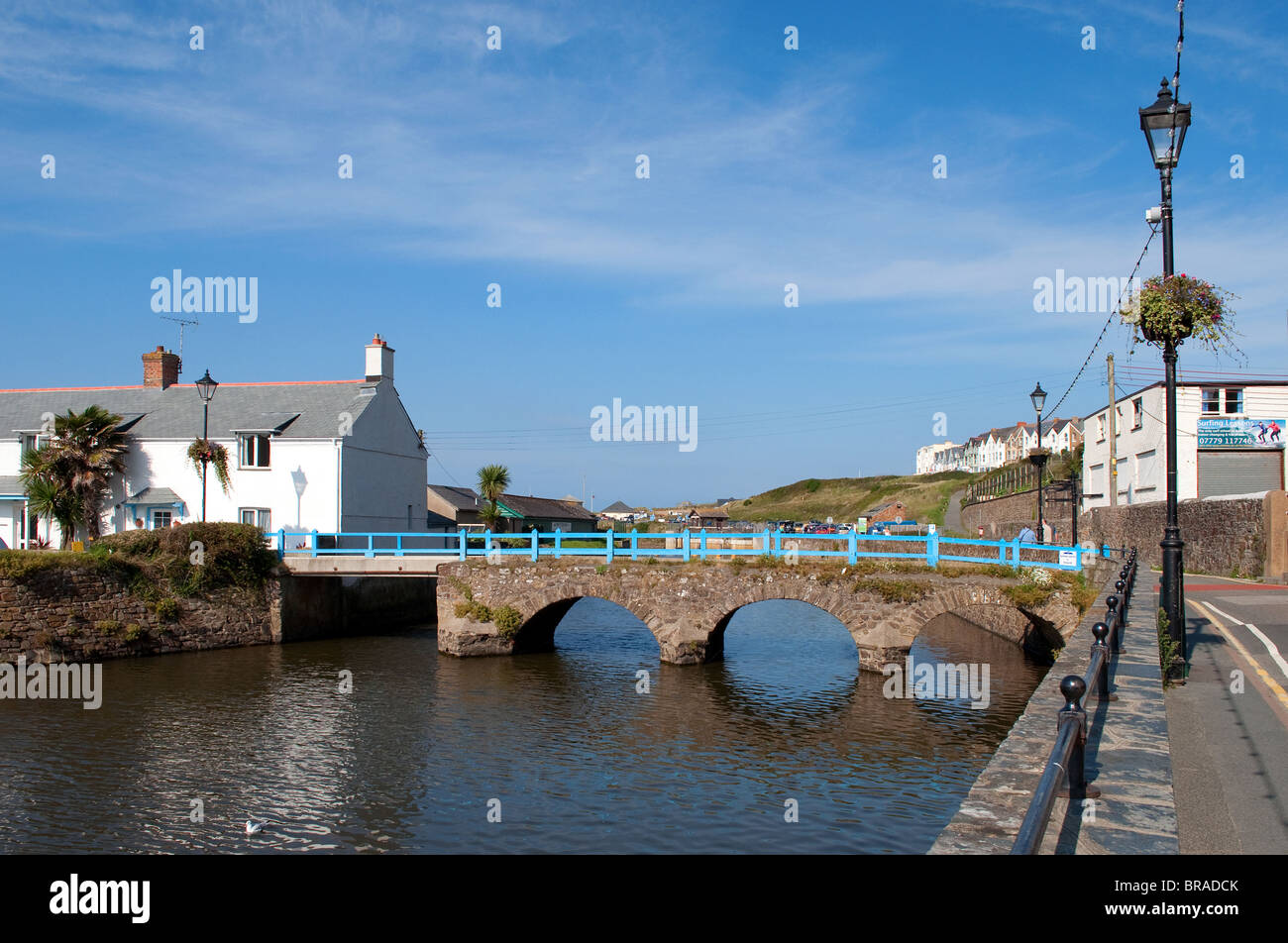 the pretty arched stone bridge over the river neet at bude in cornwall, uk the river empties into the sea at summerleaze beach Stock Photo