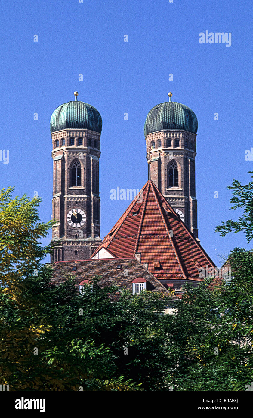 Life in Germany at the famous Frauenkirche church in downtown old village of Munich Germany Stock Photo