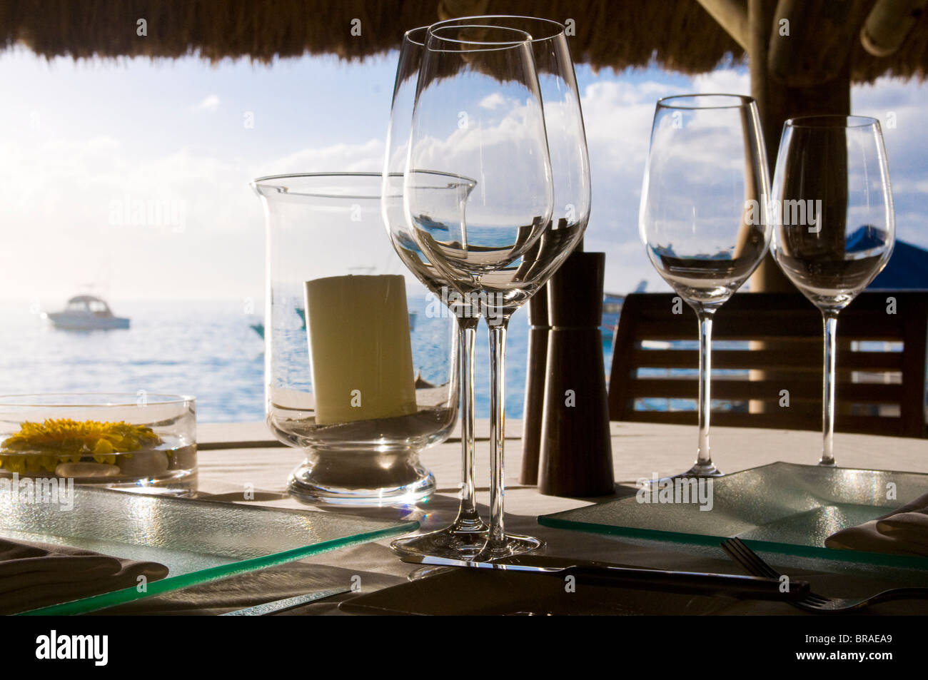 Glasses on a table of the Beachcomber Le Paradis five star hotel, Mauritius, Indian Ocean, Africa Stock Photo
