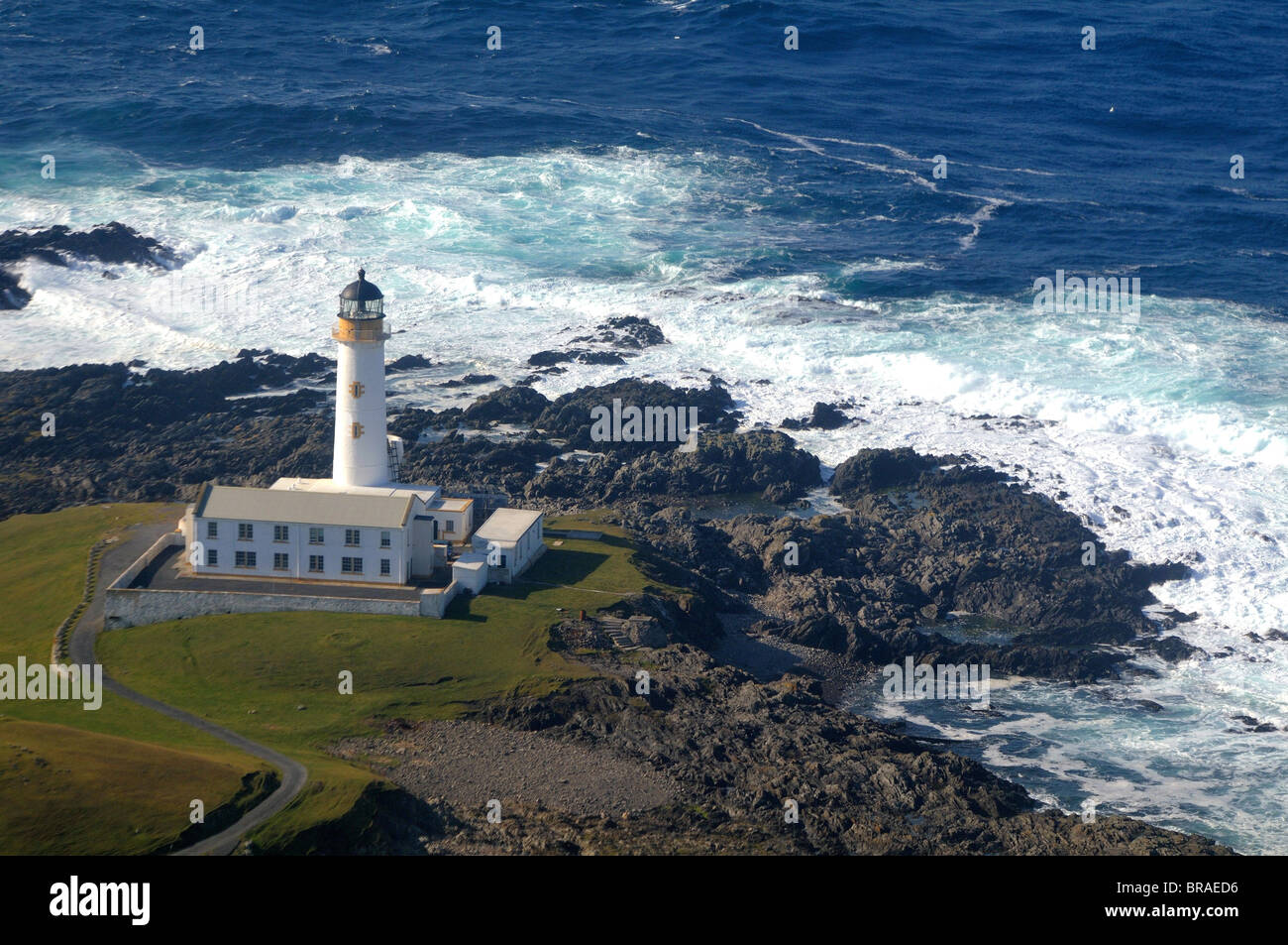 Aerial view of Fair Isle South Lighthouse (the last manned lighthouse in Scotland) Stock Photo