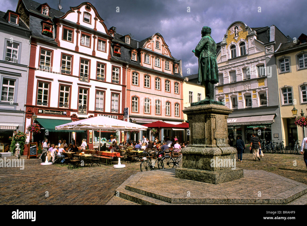 Germany  Koblenz  Old Town Center with buildings cafes and statue of Johannes Muller Stock Photo