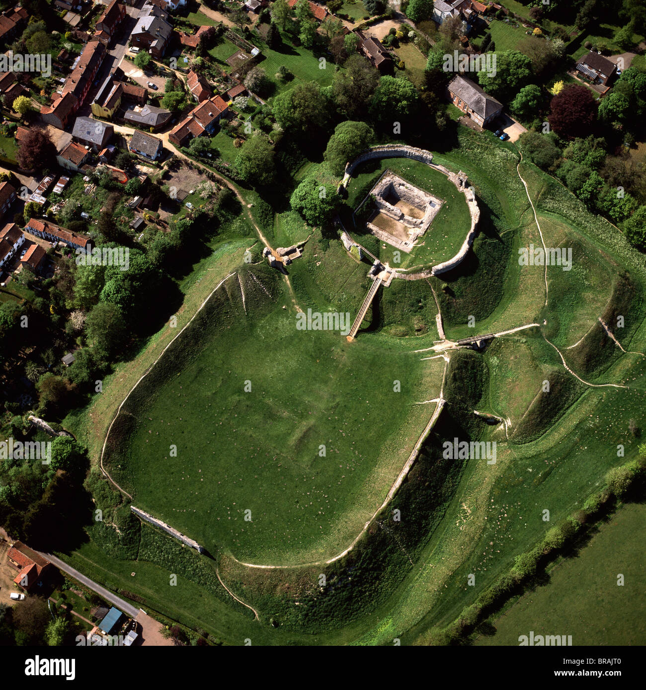 Aerial view of Castle Acre, remains of a motte and bailey castle with extensive earthworks, Castle Acre, Norfolk, England, UK Stock Photo