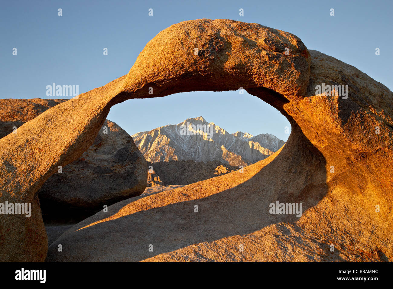 Mobius Arch and Eastern Sierras at dawn, Alabama Hills, Inyo National Forest, California, United States of America Stock Photo