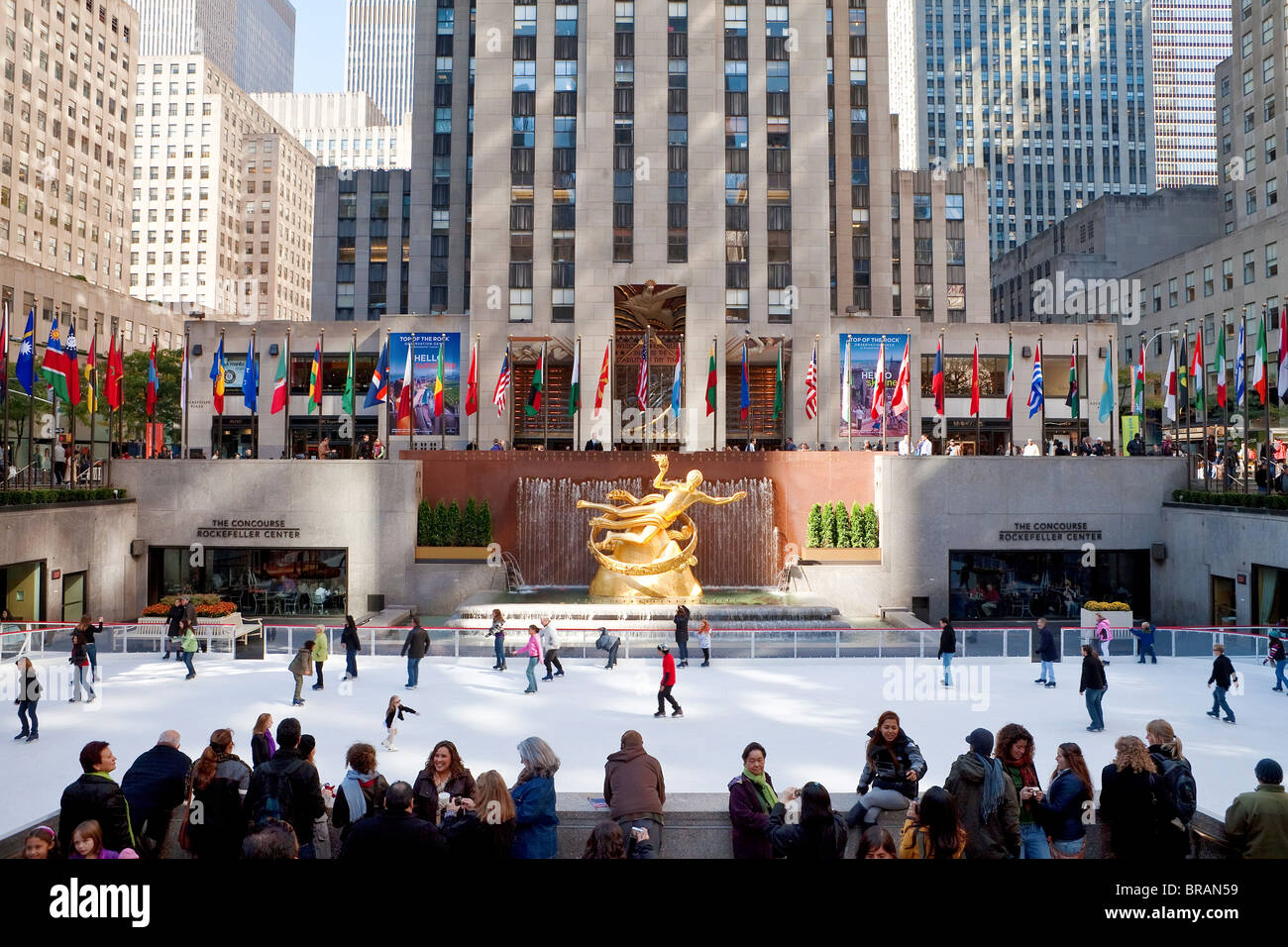 Ice Skating Rink below the Rockefeller Centre building on Fifth Avenue, New York City, New York, United States of America Stock Photo