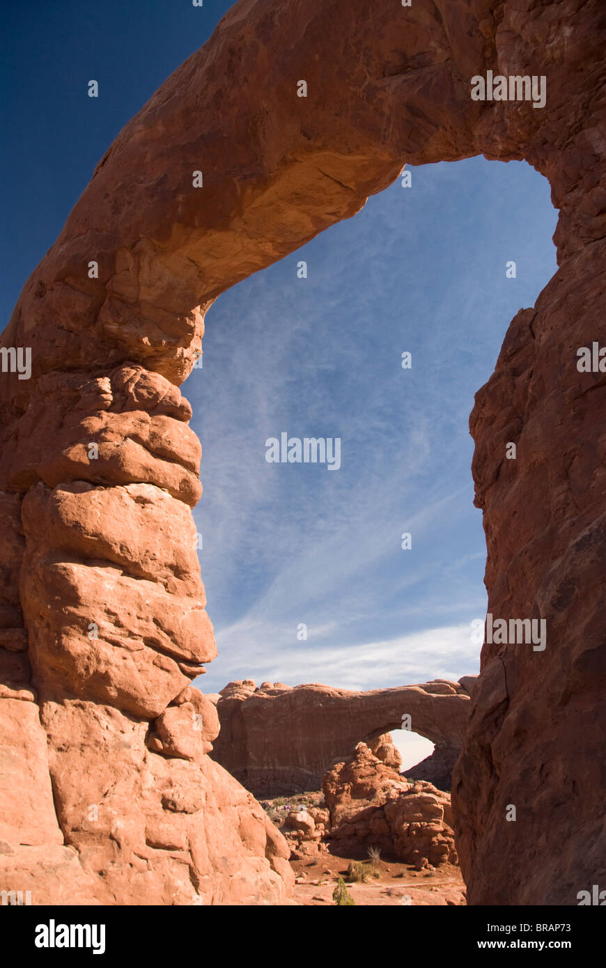 Turret Arch in the foreground, with North Window Arch in the background, Arches National Park, Utah, United States of America Stock Photo