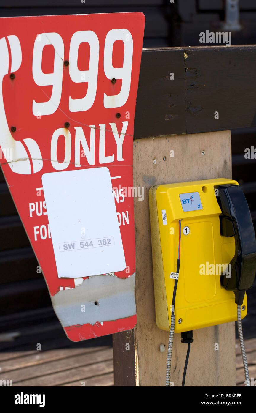 Emergency telephone on Porth Kidney beach, Cornwall Stock Photo