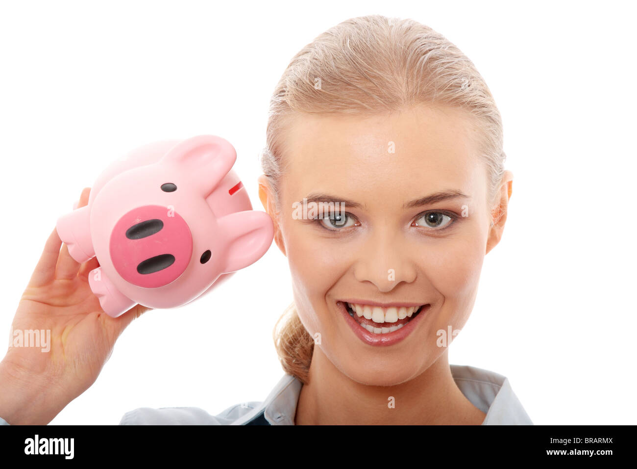 Businesswoman holding piggy bank. Isolated on white background Stock ...