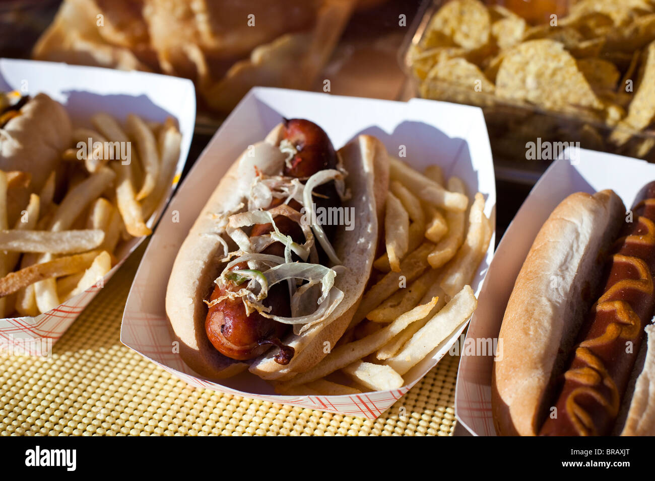 Hot dogs, sausages and french fries for sale at the country fair Stock Photo