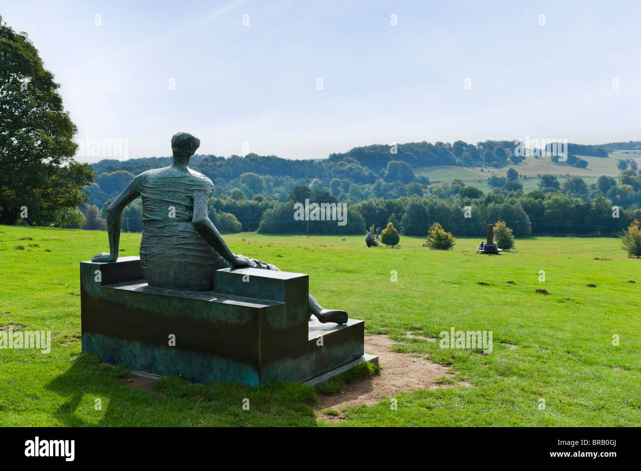 Yorkshire Sculpture Park with Henry Moore's "Draped Seated Woman" in the foreground, Wakefield, West Yorkshire, England, UK Stock Photo