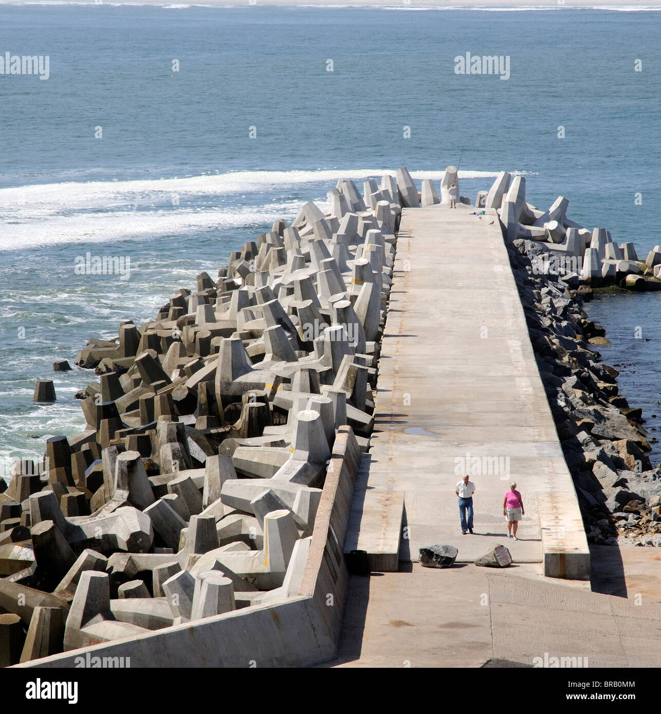 Dolosse protect the harbour wall at Yzerfontein a popular seaside resort on the west coast of South Africa Stock Photo