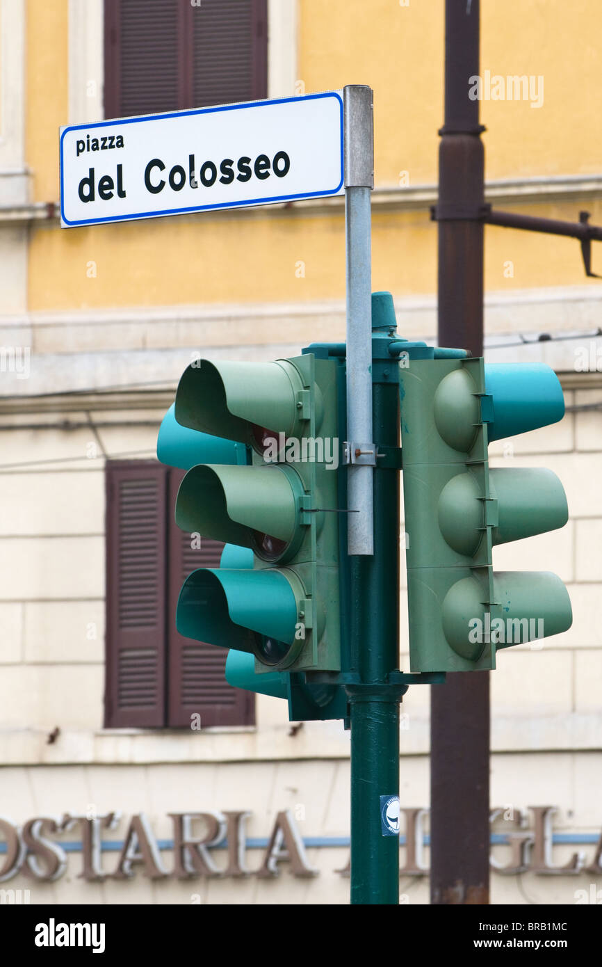 Italian traffic lights with Colosseum sign above Stock Photo