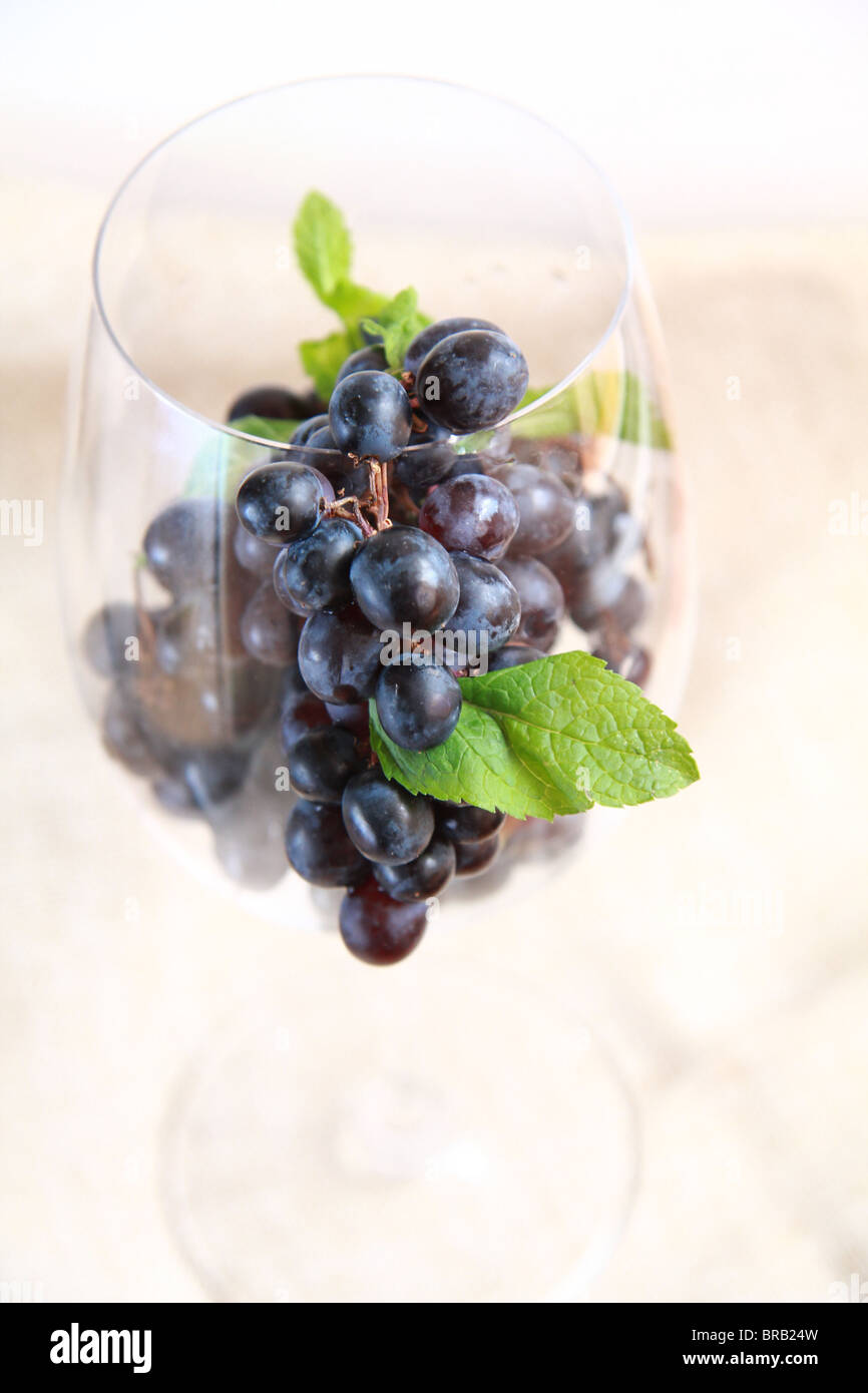 Grapes in a glass Stock Photo - Alamy