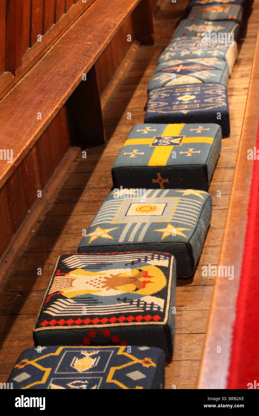 kneelers kneels Christian Catholic pray prayer communion Stock Photo