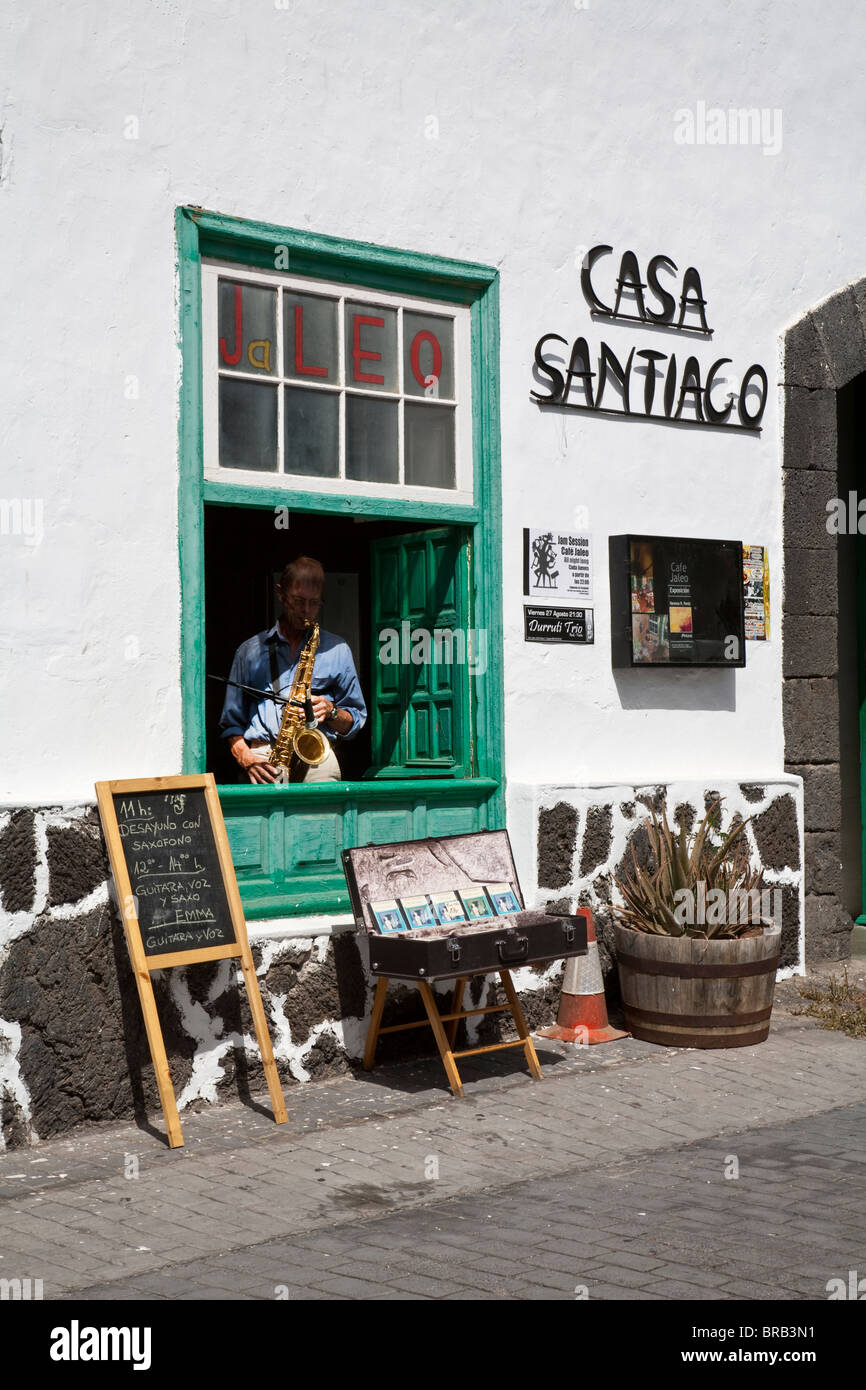 Saxophone player in window of Casa Santiago bar in Teguise, Lanzarote