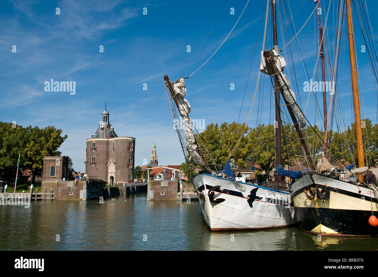 The Drommedaris was built as a defence tower as part of the 16th-century town walls. old Port Harbour  VOC Dutch The Netherlands Holland. Stock Photo