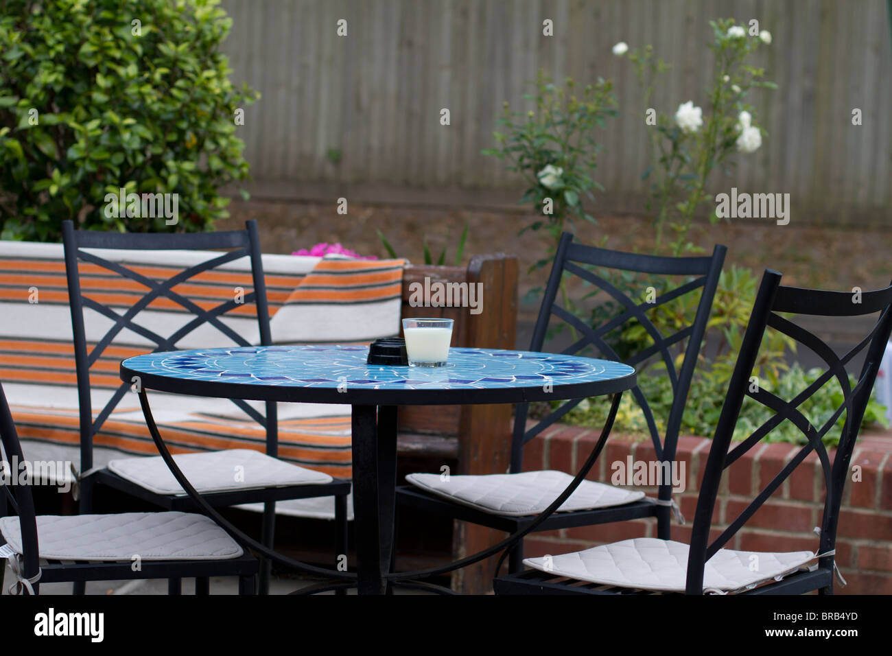 Empty Garden Table and Chairs Stock Photo