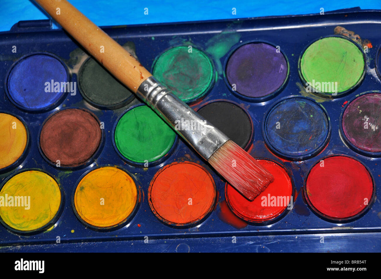 water color / colour paint  pallet with paintbrush. Stock Photo