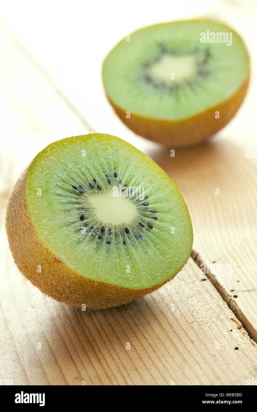 kiwi fruit on wooden table Stock Photo