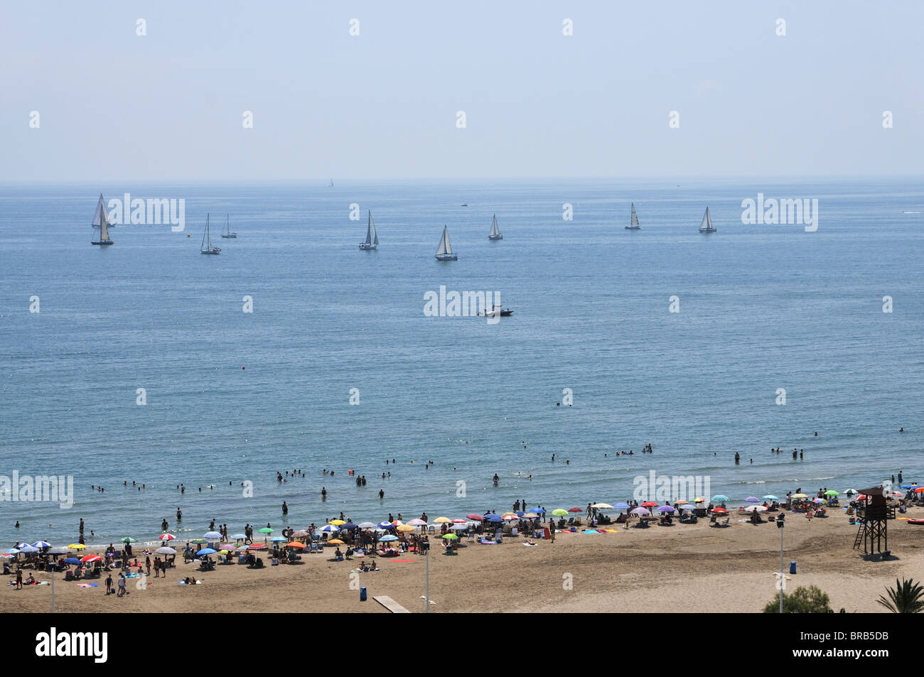 Sailing boats near to the beach in summertime. Stock Photo