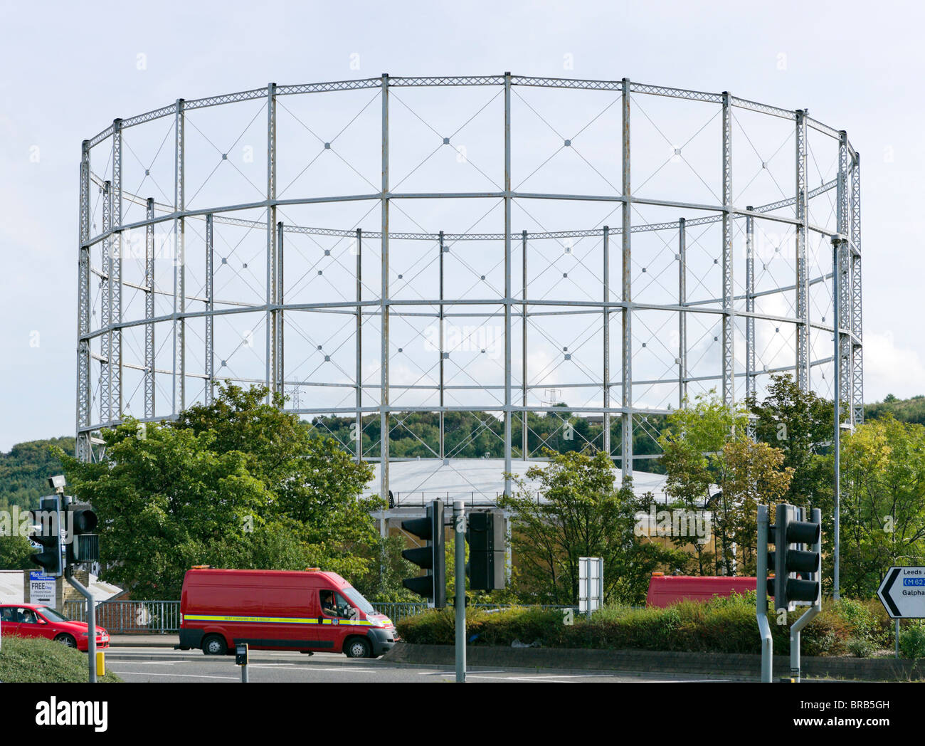 Empty gasometer on the outskirts of Huddersfield, West Yorkshire, England, United Kingdom Stock Photo