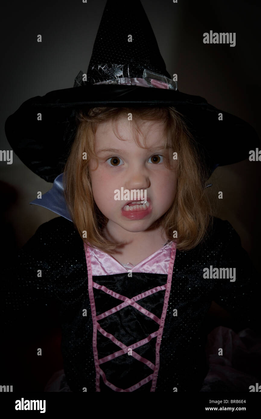 Young girl dressed as witch for Halloween. Stock Photo