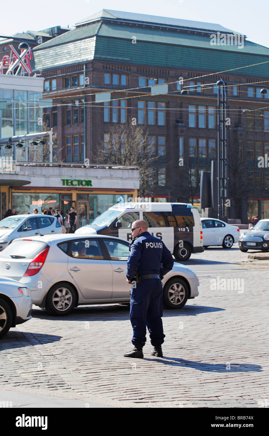 Finnish police standing at Mannerheimintie, Helsinki, Finland Stock Photo