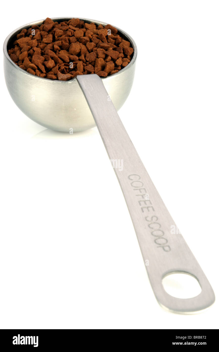 fresh instant gourmet coffee scoop isolated against white background