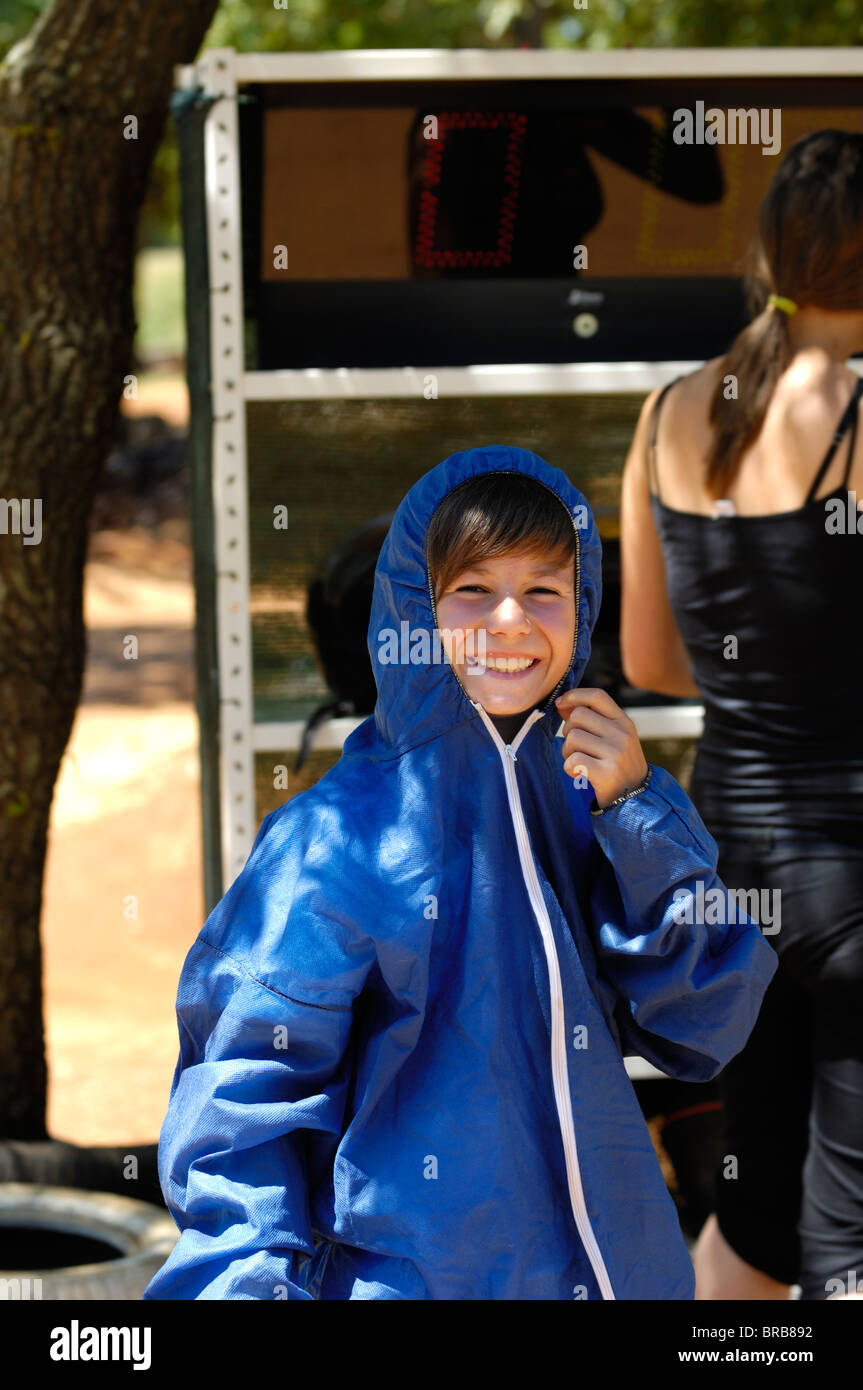 Teenage Boy in Racing Suit Stock Photo