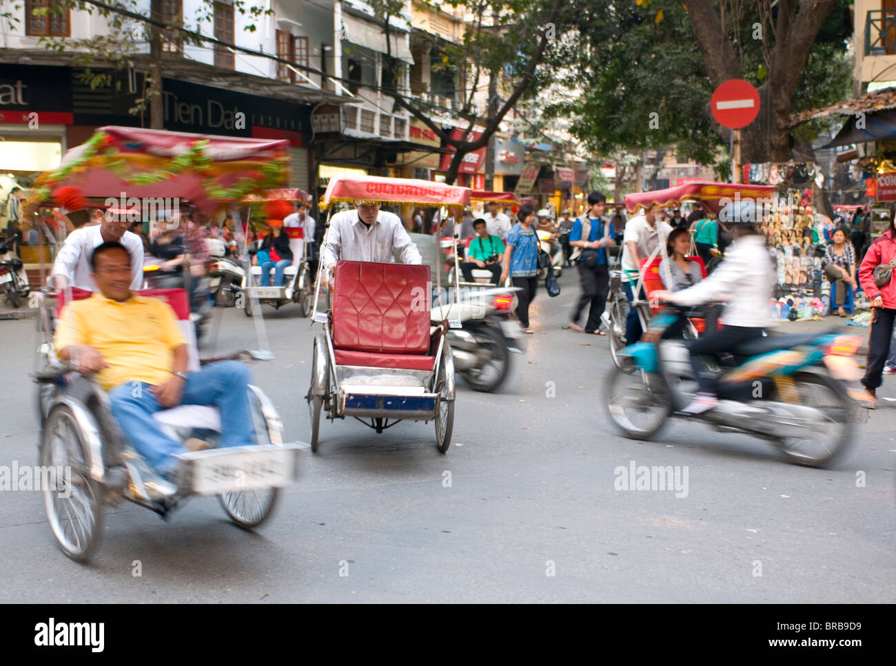 Busy street with rickshaw drivers, Hanoi, Vietnam, Indochina, Southeast ...