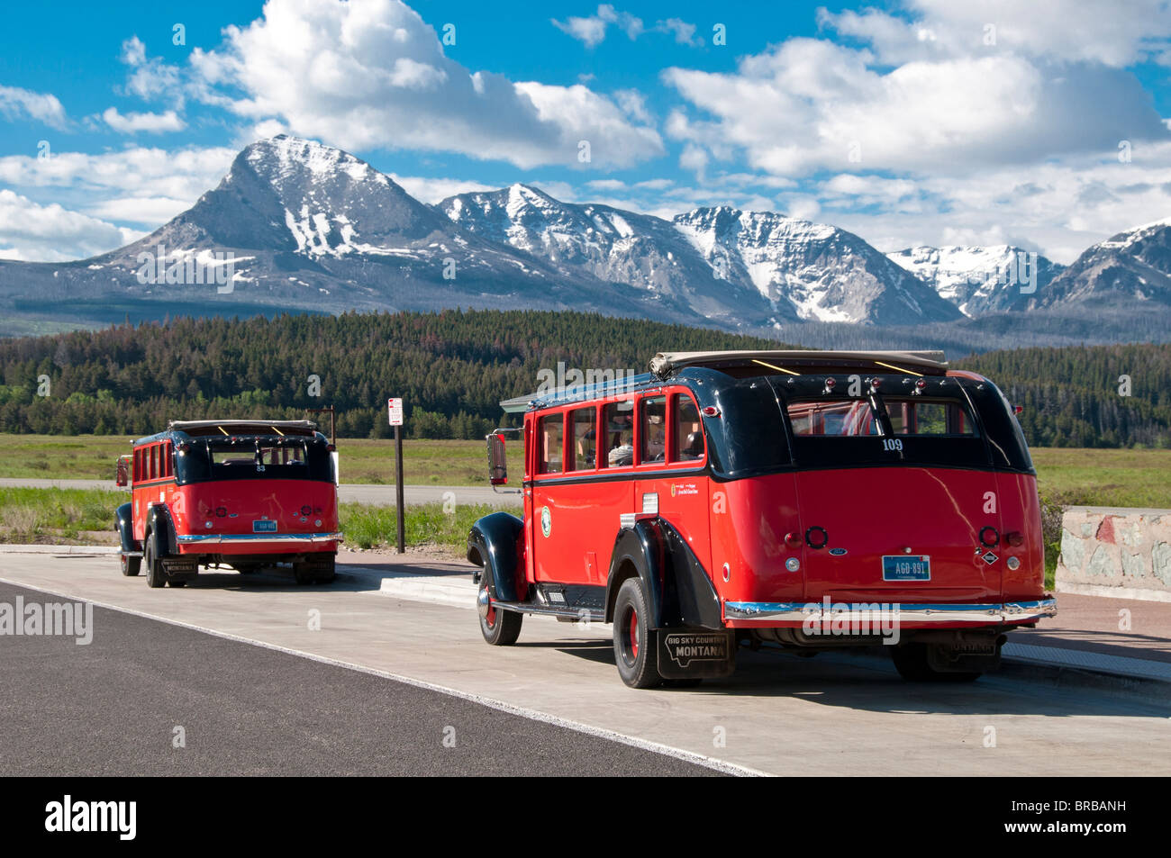 Red buses at Saint Mary Lake Visitor Center, Glacier National Park, Montana. Stock Photo