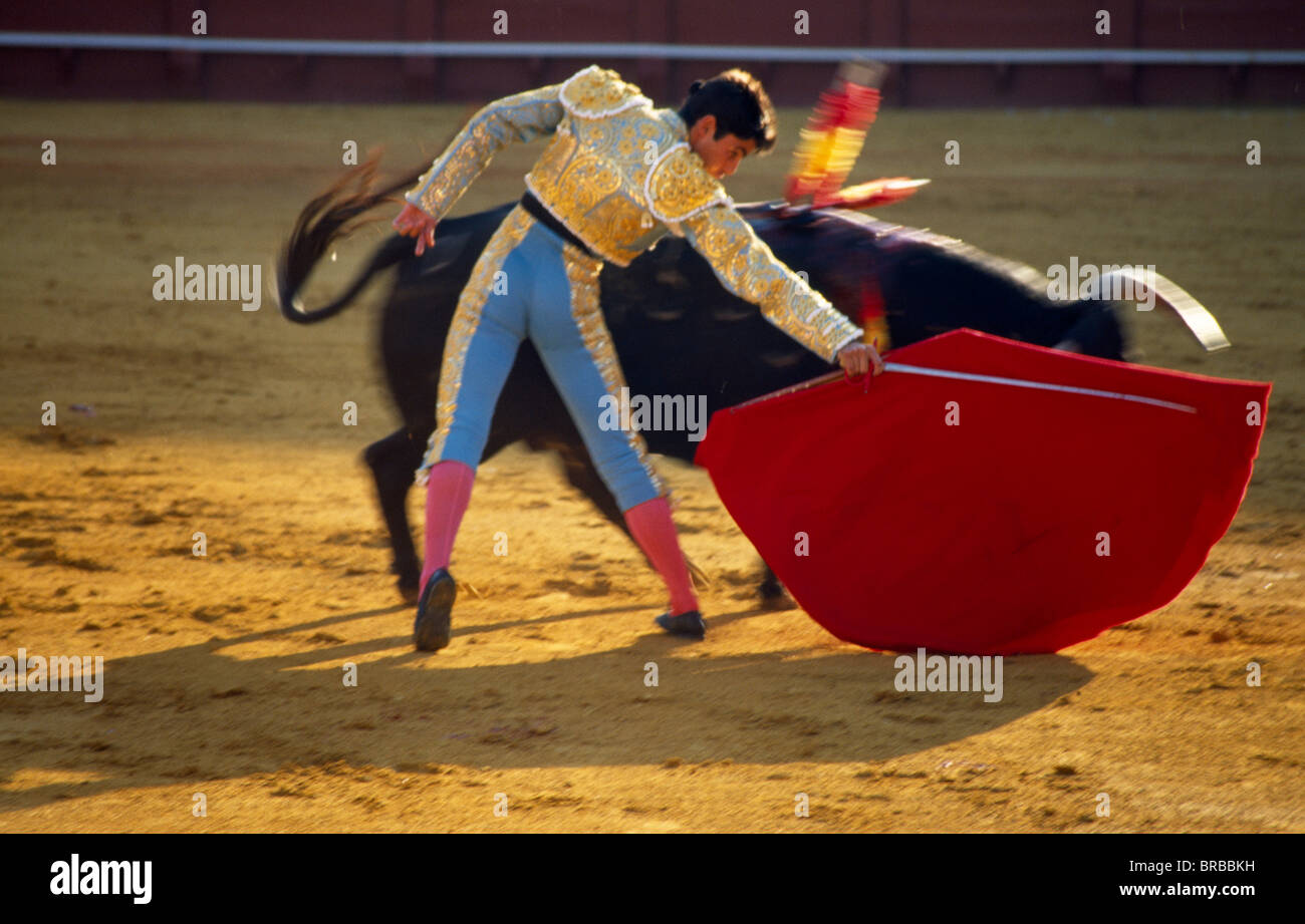Spain Andalucia Seville Matador Holding Sword Behind Raised Cape In