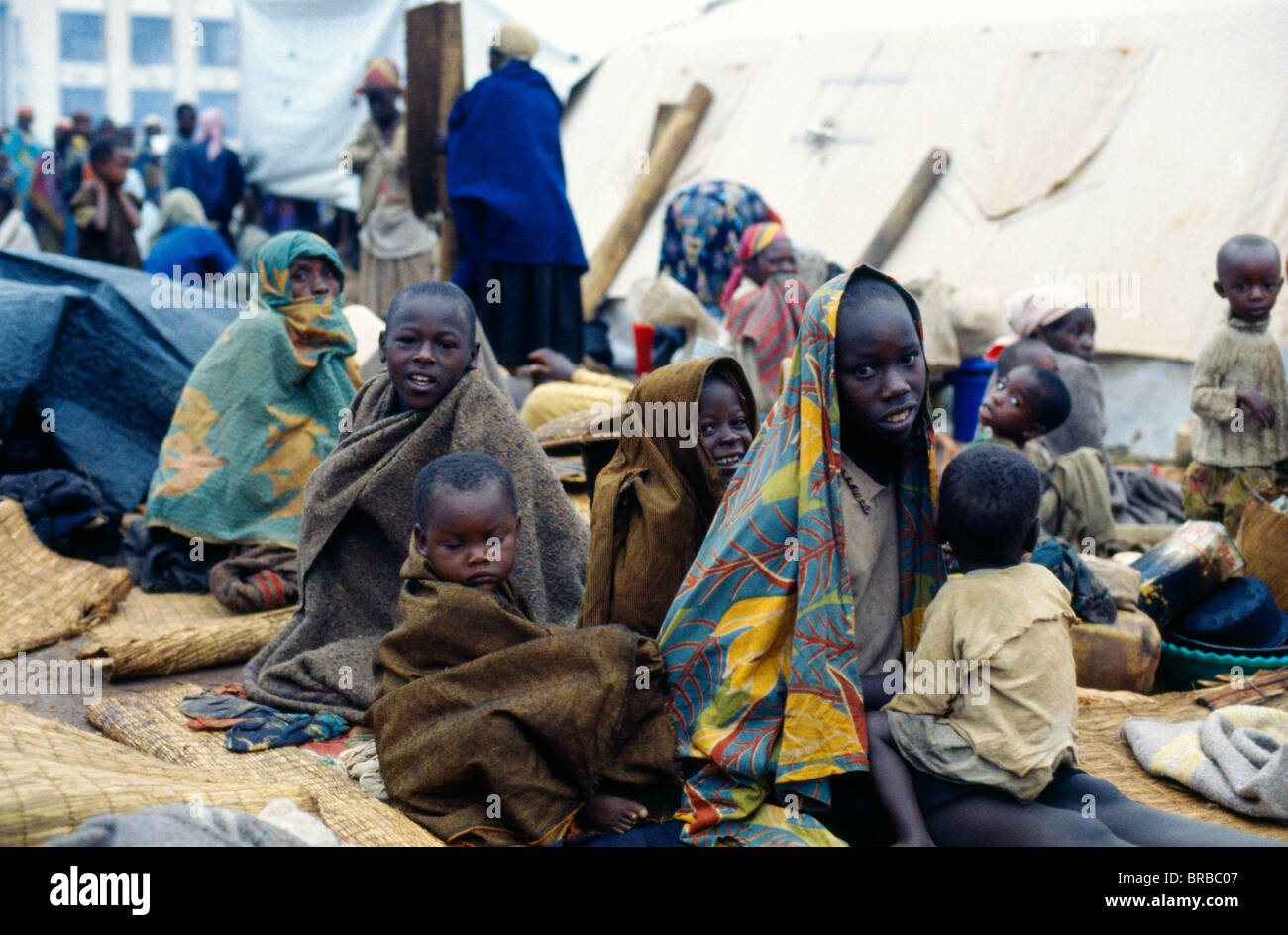 Congo Central Africa Bukavu Rwandan Refugees Wrapped In Blankets Without Shelter Stock Photo